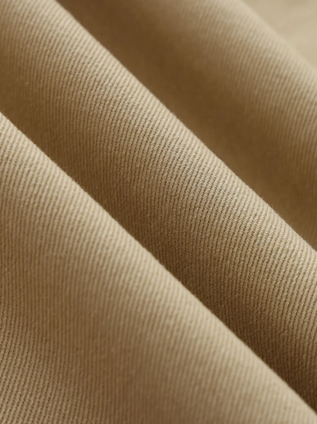 Twisted-Seam Belted Curved-Blade Pants: The Epitome of Understated Luxury